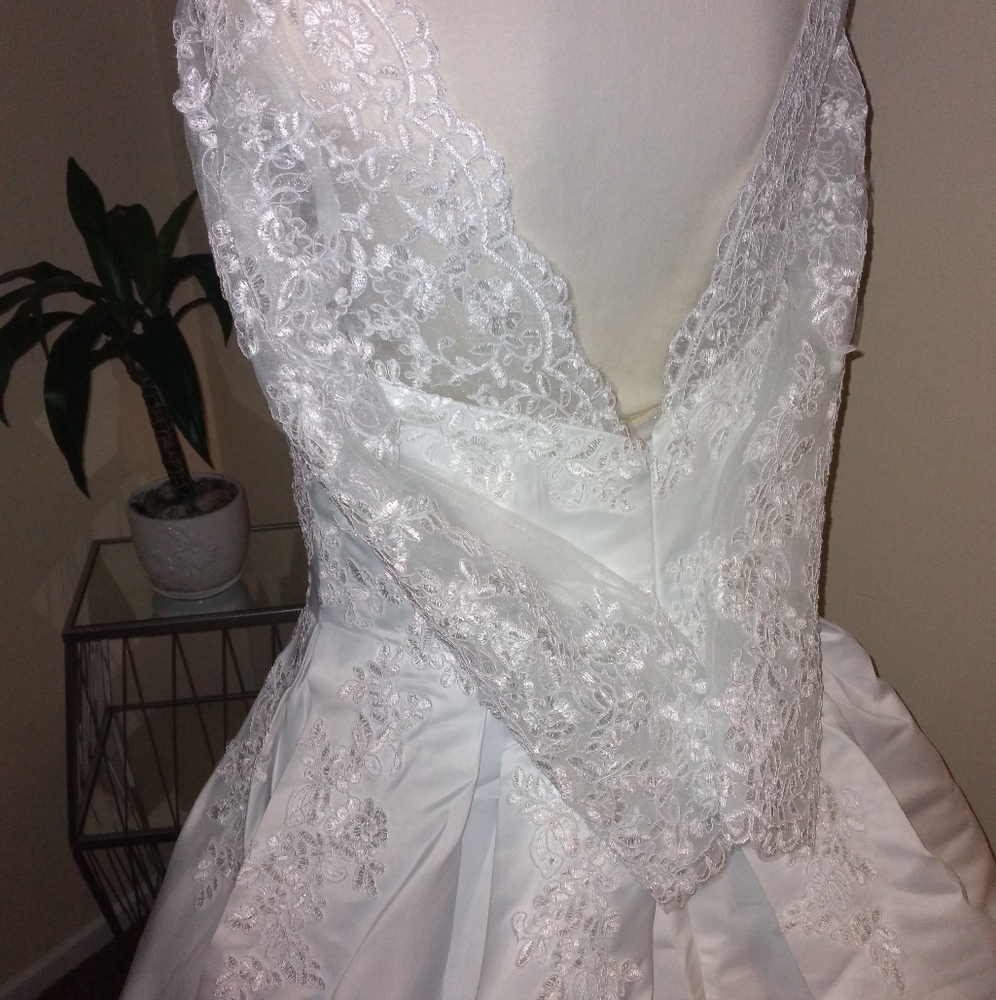 Wedding gown with court train and lace sleeves